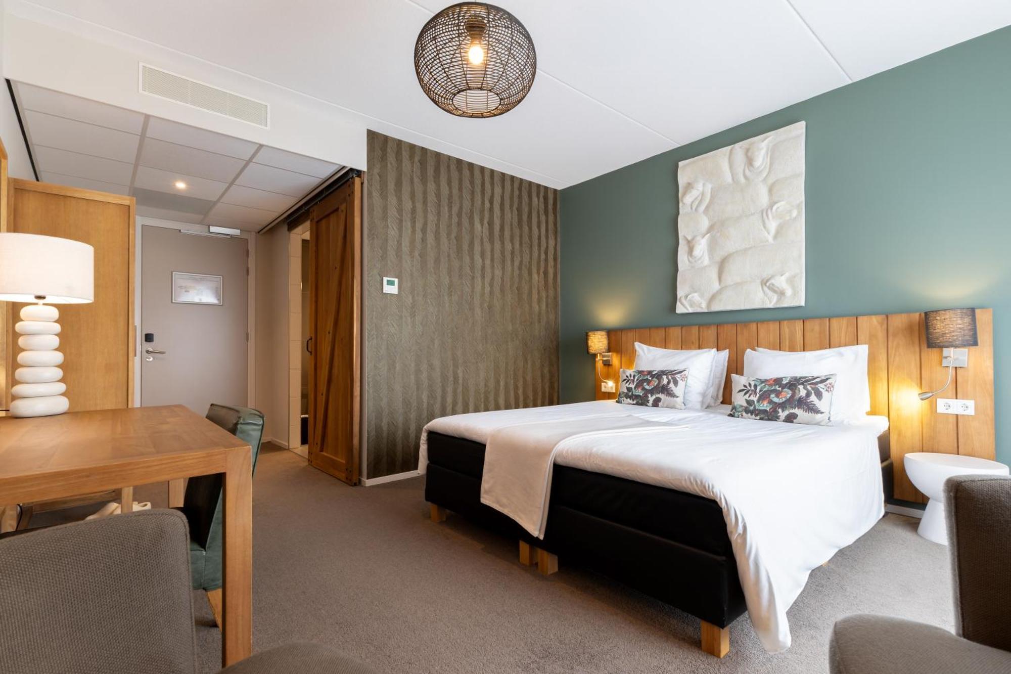 Boutique Hotel Texel De Cocksdorp  Exterior photo A room at the hotel